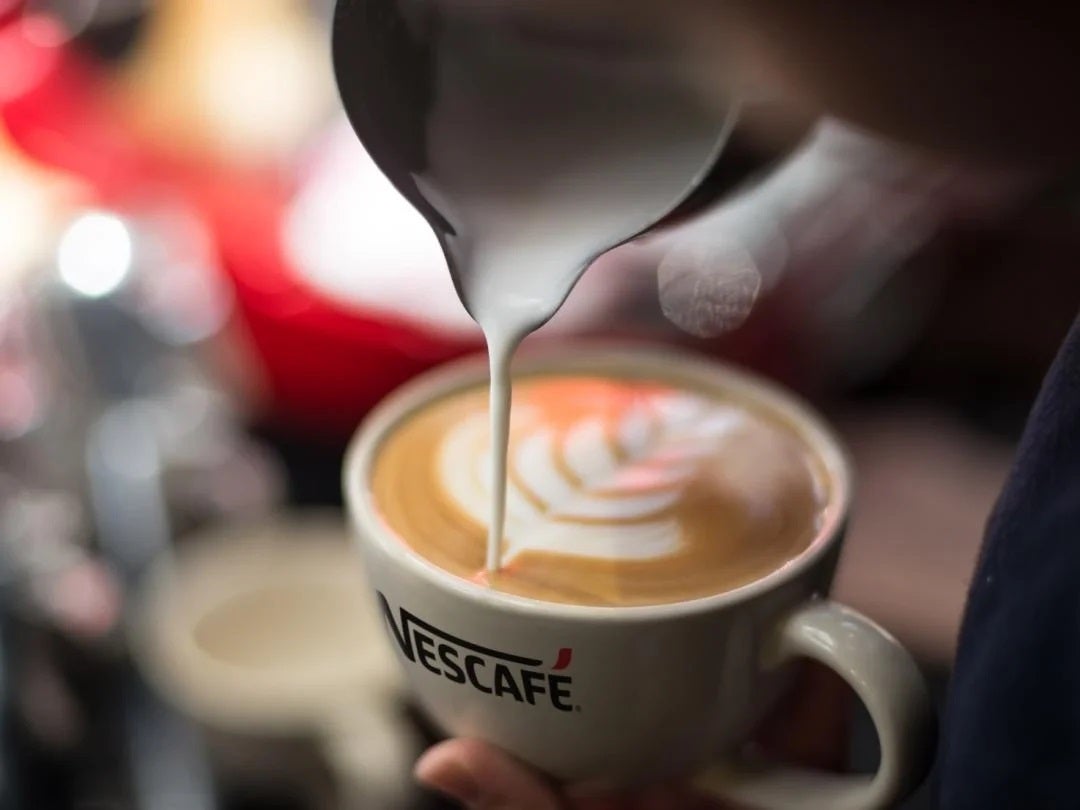 Making barista cup of coffee