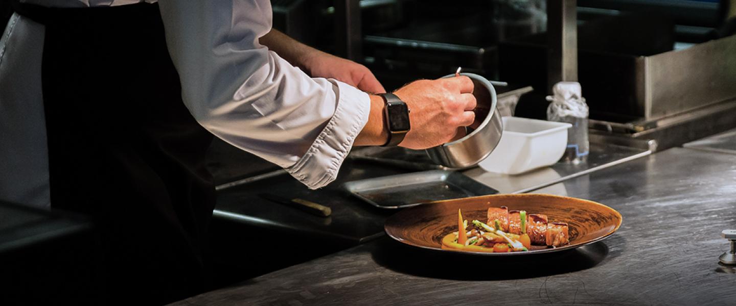 Chef plating food